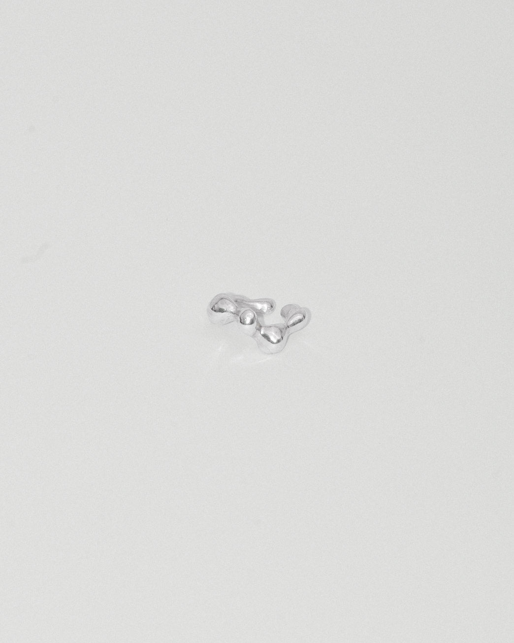 Cord ear cuff